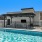 a swimming pool in front of a building
